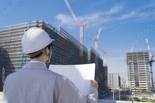 Fototapeta 図面を持つビジネスマン　建設現場