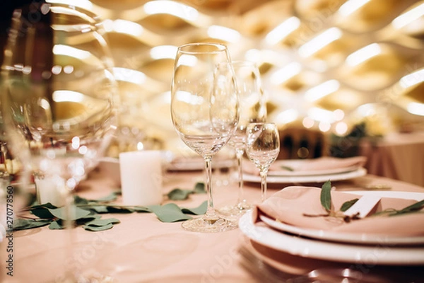 Fototapeta Table setting for a wedding ceremony at swimming pool. round table with white tablecloth