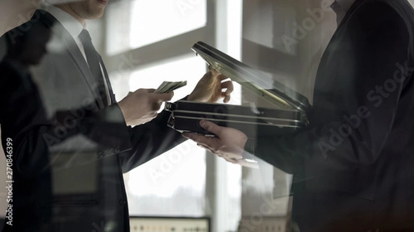 Fototapeta Lawyer opening case and looking at money, concept of illegal job offer, bribe