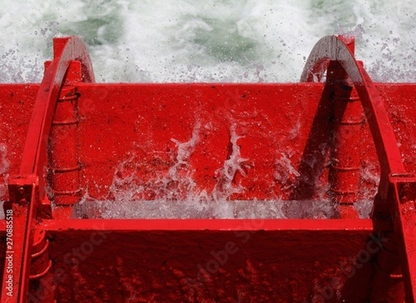 Obraz red boat in water