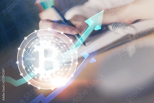 Obraz Cryptocurrency hologram, bitcoin, ico theme over hands taking notes background. Concept of blockchain. Multi exposure
