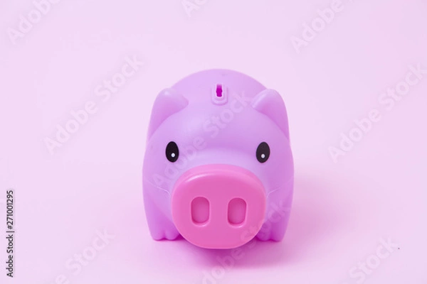 Obraz Piggy bank on soft pink background
