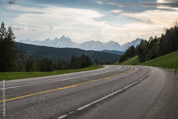 Fototapeta Road leading to the mountains, tetons, wyoming
