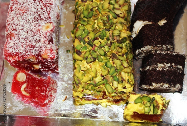 Fototapeta Rahat lakoum. Eastern sweets. Turkish sweets. Several types of Turkish Delight, including nuts.