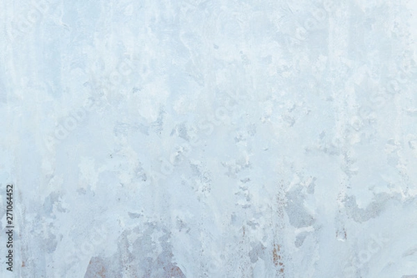 Fototapeta Frosty patterns on a frozen ice box in the early morning