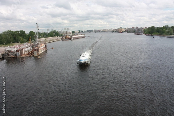 Fototapeta view from the bridge to the Neva river and boats of St. Petersburg   