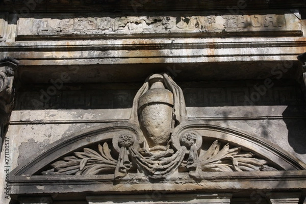 Fototapeta elements of decoration of ancient stone monuments  