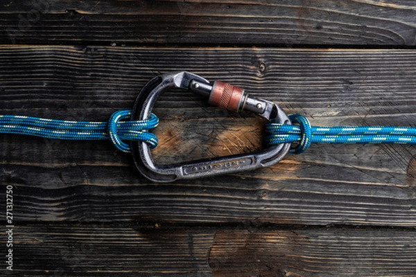 Obraz Close up of climbing gear on wooden desk - table top shot