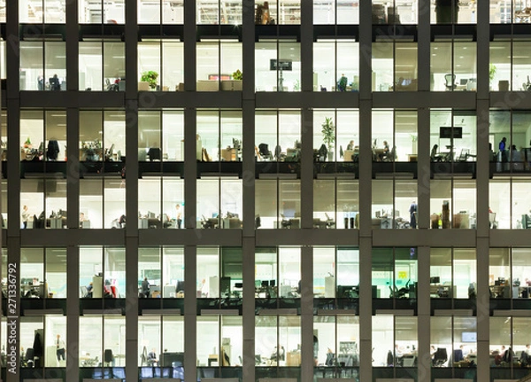 Fototapeta Modern office building at dusk