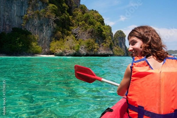 Fototapeta Girl kayaking in the sea near Phi-Phi