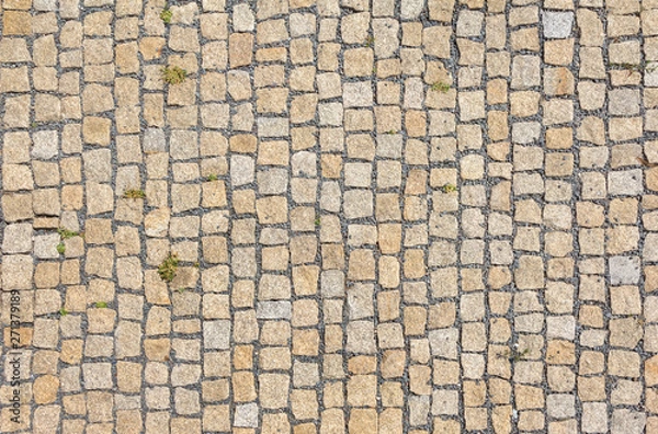 Obraz Old road paved with granite stones.