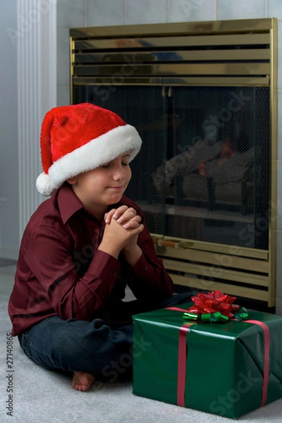 Obraz A boy praying for gift