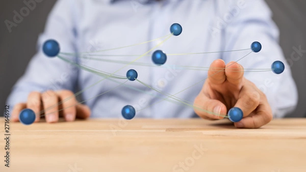 Fototapeta Stack of hands showing unity and teamwork .