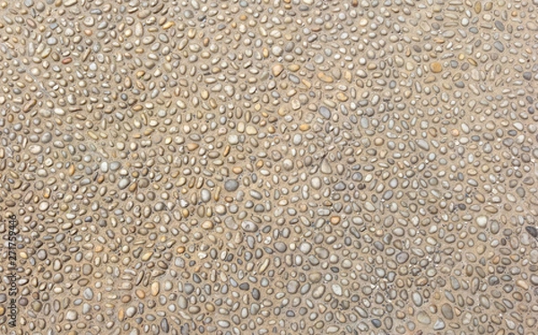 Obraz Small rounded stones in the ground.