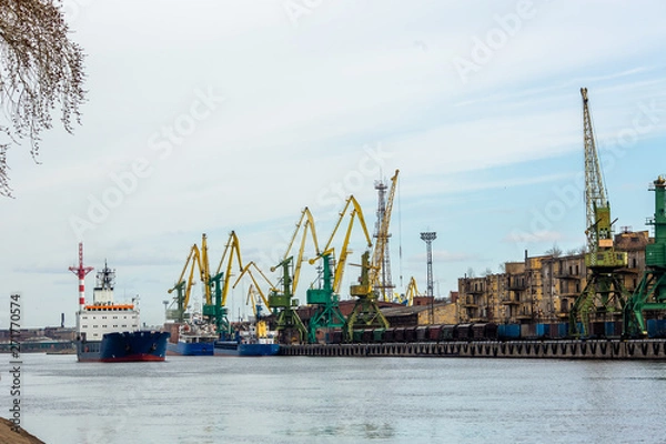 Fototapeta industrial port with containers. crane