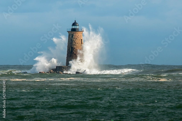 Obraz Huge Waves Surround Whaleback Lighthouse as Sun breaks Through Clouds in Maine in New England