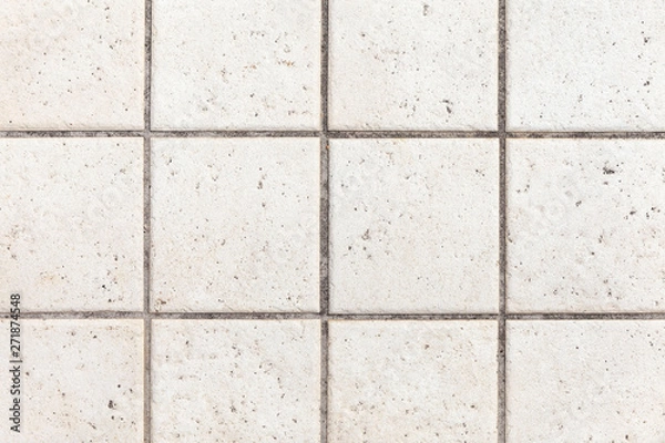 Fototapeta Abstract background of old cobblestone pavement close-up