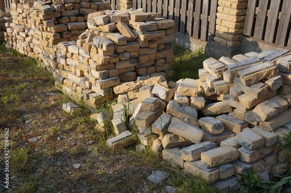 Obraz folded bricks for fence construction