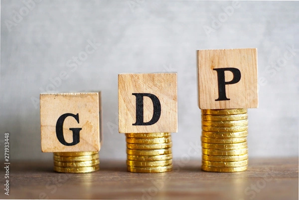 Obraz Text "GDP" on wood cube decorate on growth coins stack, economic concept.