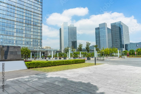 Fototapeta modern buildings and empty pavement in china.