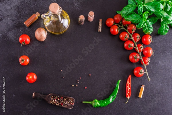 Fototapeta Ingredients for preparation of tasty Italian pizza. Cherry tomato, spices, basil, chili pepper