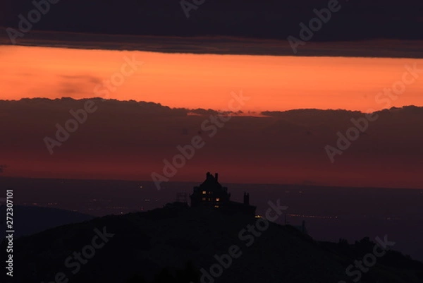 Obraz silhouette of man on top of mountain