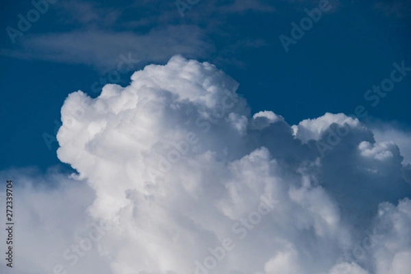 Obraz thick fluffy white cloud  under blue sky