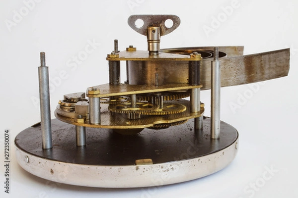 Obraz Broken old metallic clockwork mechanism on white background