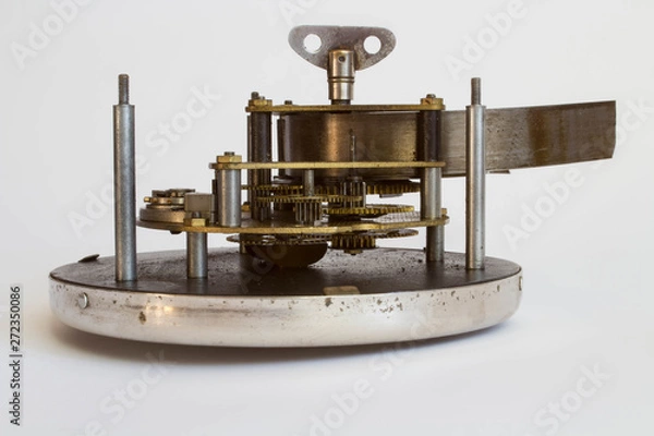 Obraz Broken old metallic clockwork mechanism on white background