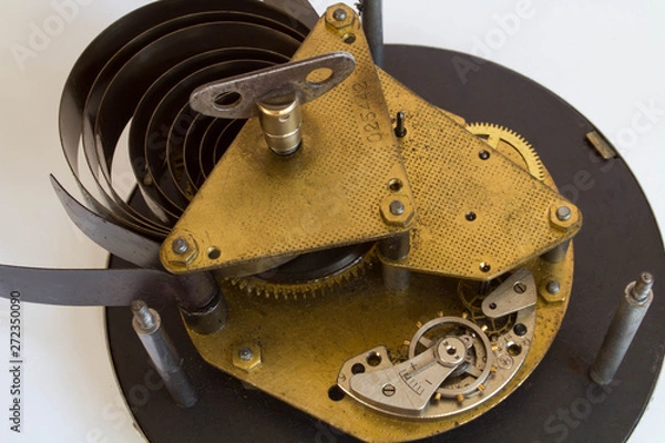 Obraz Broken old metallic clockwork mechanism on white background