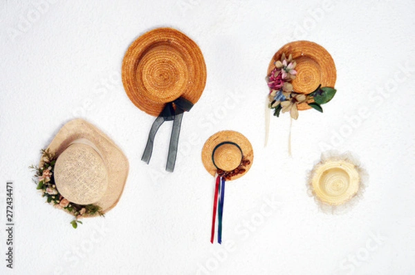 Obraz Straw hats on a wall