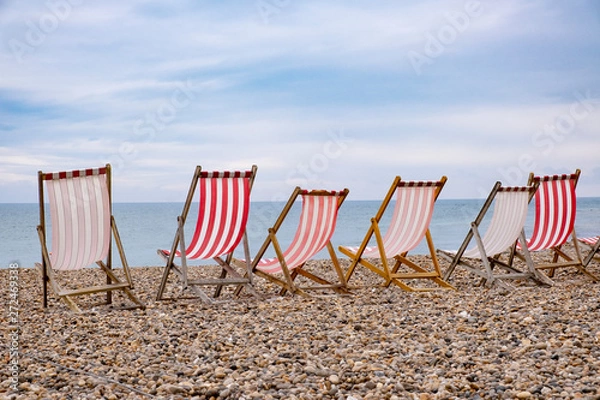 Obraz Deckchairs on beach at english seaside