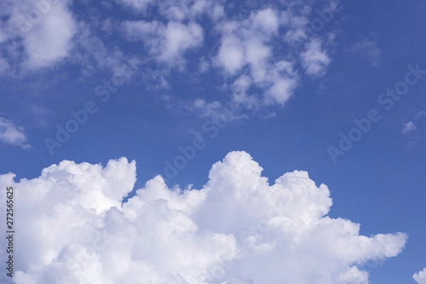 Fototapeta Blue sky and white clouds, rain clouds on sunny summer or spring day.