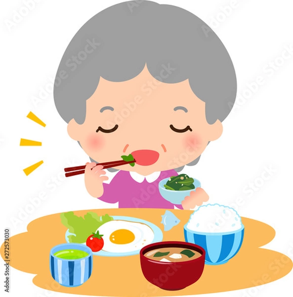 Fototapeta 朝食を食べるシニア女性