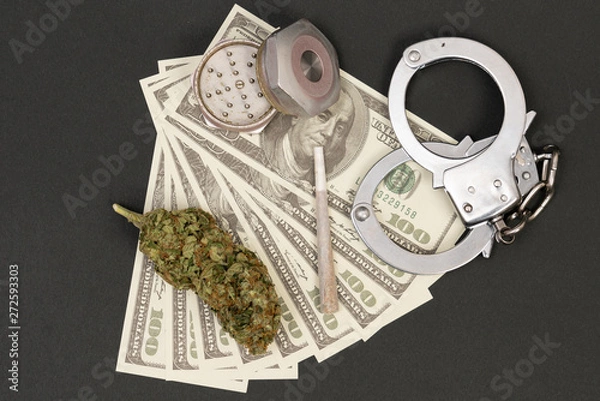 Fototapeta Closeup of marijuana and grinder