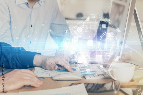 Fototapeta Social network theme hologram with businessman working on computer on background. Multi exposure.