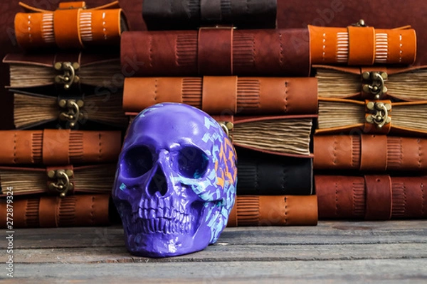 Obraz skull on the leather journal book background