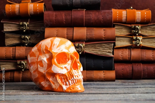 Obraz skull on the leather journal book background