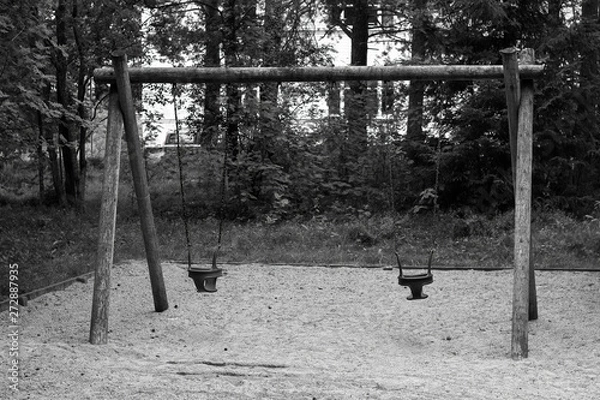 Fototapeta Swing set in the playground