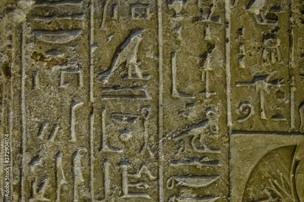 Fototapeta Egyptian ancient hieroglyphs on the stone wall
