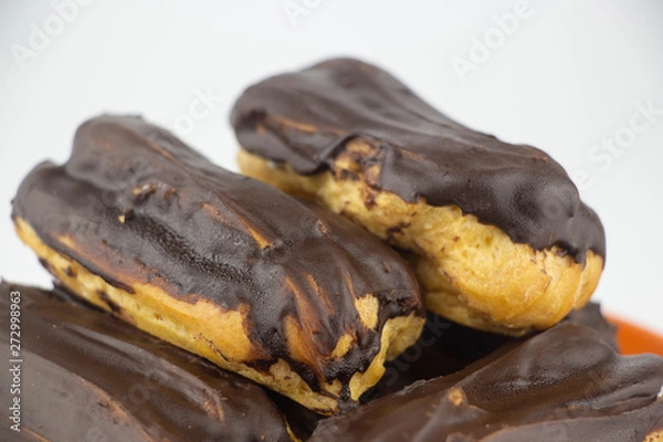 Obraz Chocolate eclairs with hot coffee