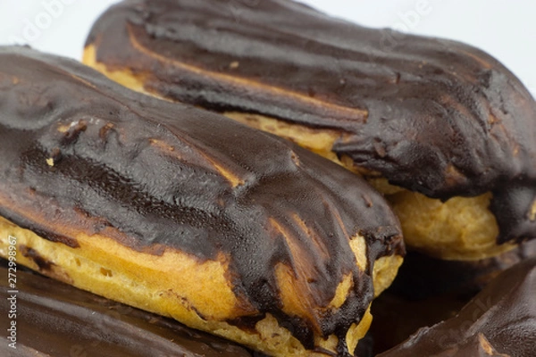Obraz Chocolate eclairs with hot coffee