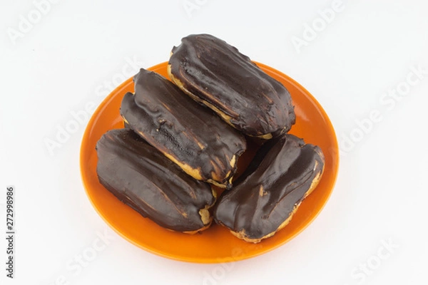 Obraz Chocolate eclairs with hot coffee