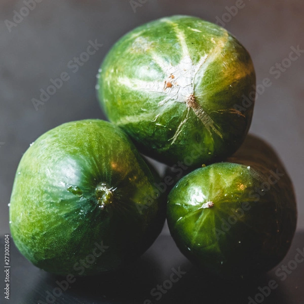 Fototapeta Stacked up cucumbers