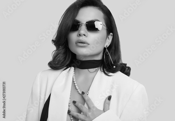 Obraz Attractive elegant woman with dark hair in fashion white suit