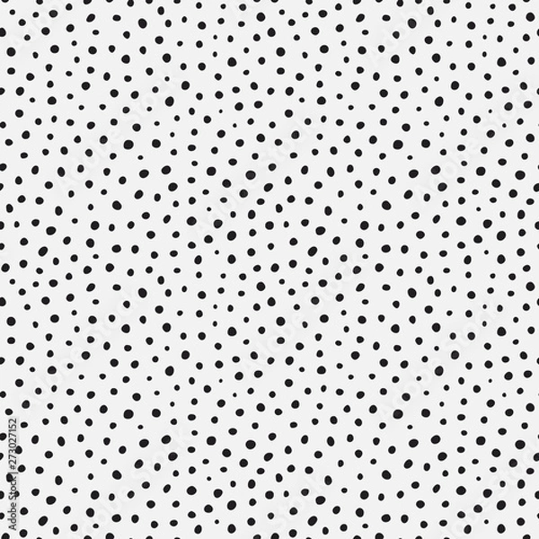 Fototapeta Randomly placed polka dots, hand drawn spots seamless vector pattern. Scattered big and small circles, points in various sizes. Monochrome retro background. Decorative black and white design tiles.