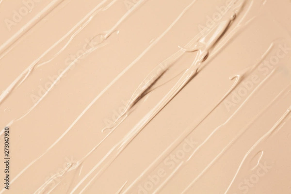 Obraz Close up of face liquid foundation texture. Cosmetic background isolated on white