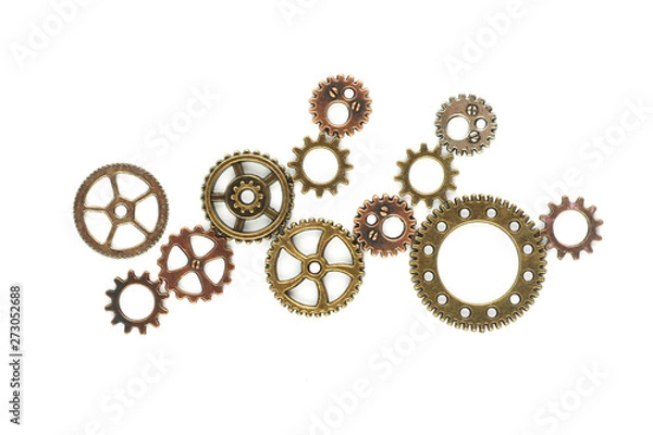 Fototapeta Gears bronze and copper shades of different diameters and type on a white background...