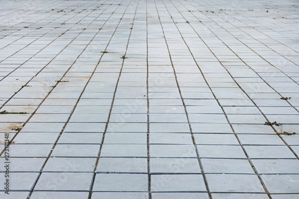 Fototapeta Cement blocks are paved on the ground