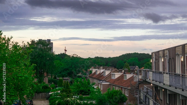 Fototapeta Dutch flat complex with storm weather